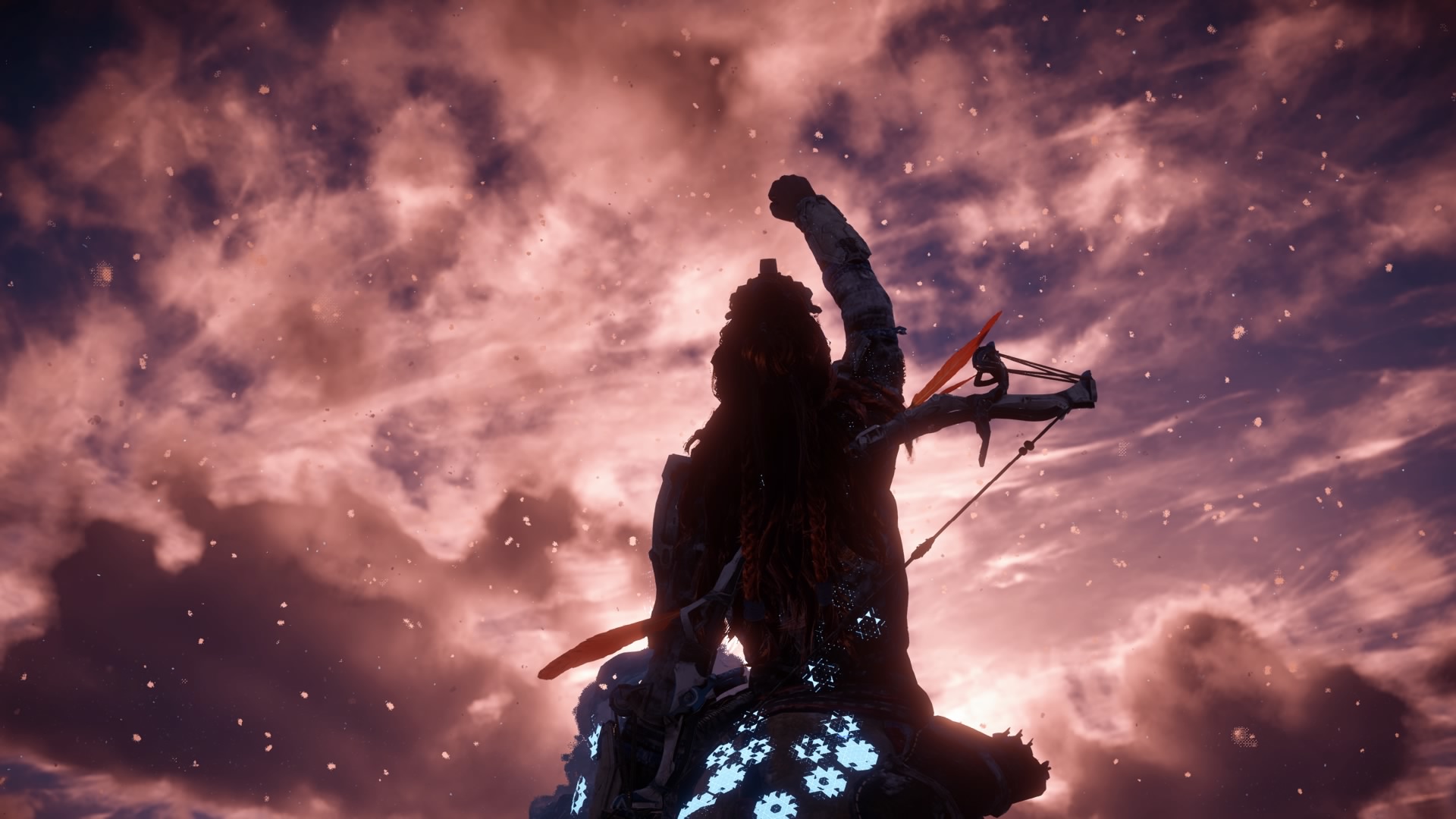 A femme looking person wearing shiny armour facing the dawn sky punching her fist in the air.